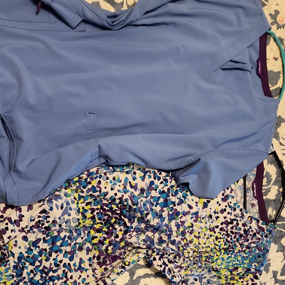 Blue Scrub Top and Multicolor Patterned Scrub Pants